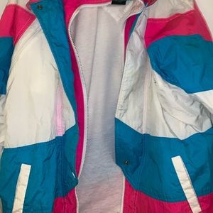 White, blue and pink windbreaker